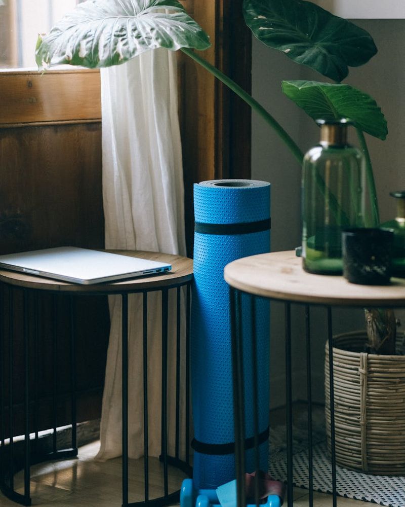 Bright, open living room with a yoga mat on the floor.